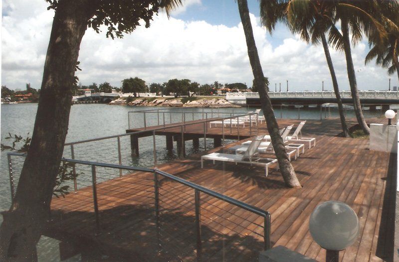 Deck Install — White Chairs And Trees In Deck in Miami, FL
