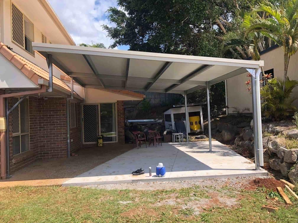 A Carport Is Being Built In The Backyard Of A House — Just Sheds In Kunda Park, QLD