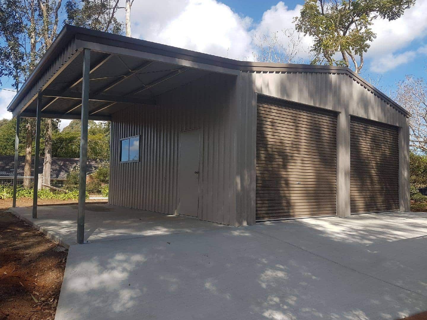 A Garage With A Canopy Over It And A Driveway — Just Sheds In Kunda Park, QLD