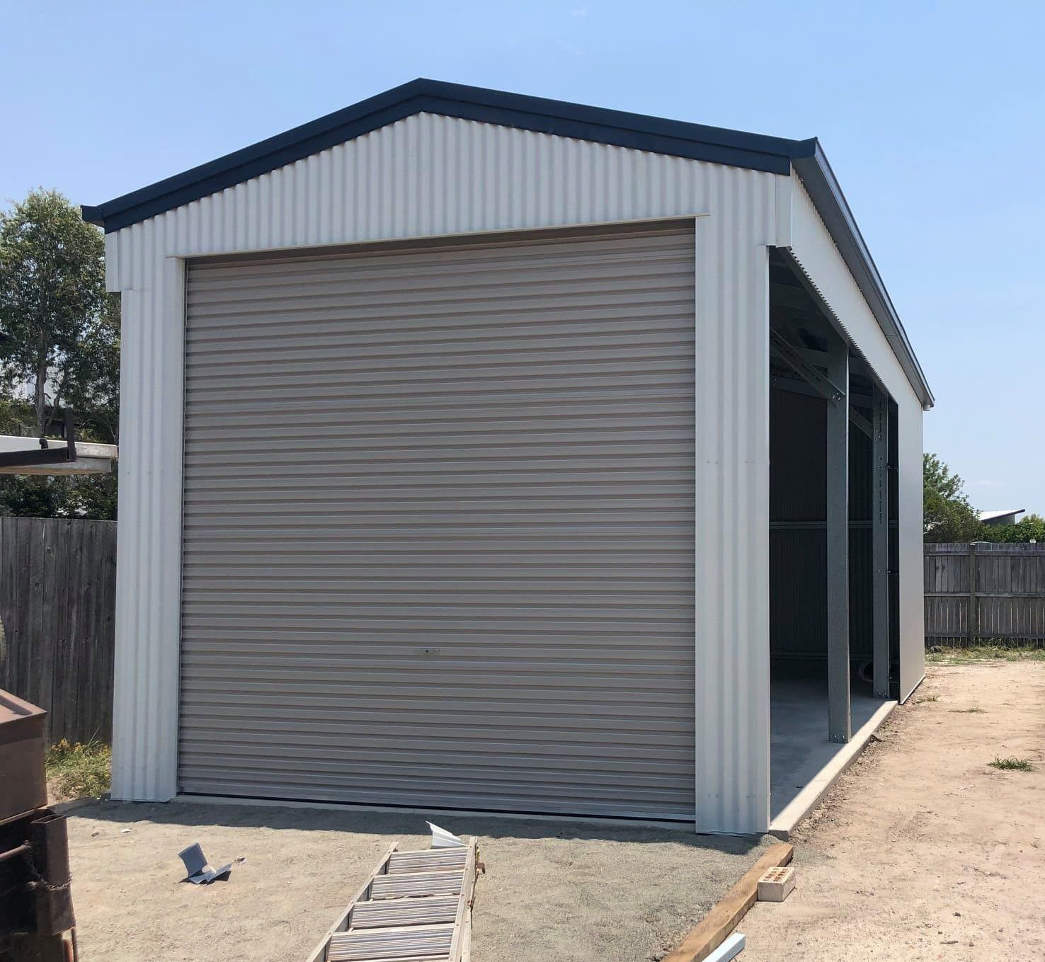 A garage with a ladder in front of it — Just Sheds In Brisbane, QLD