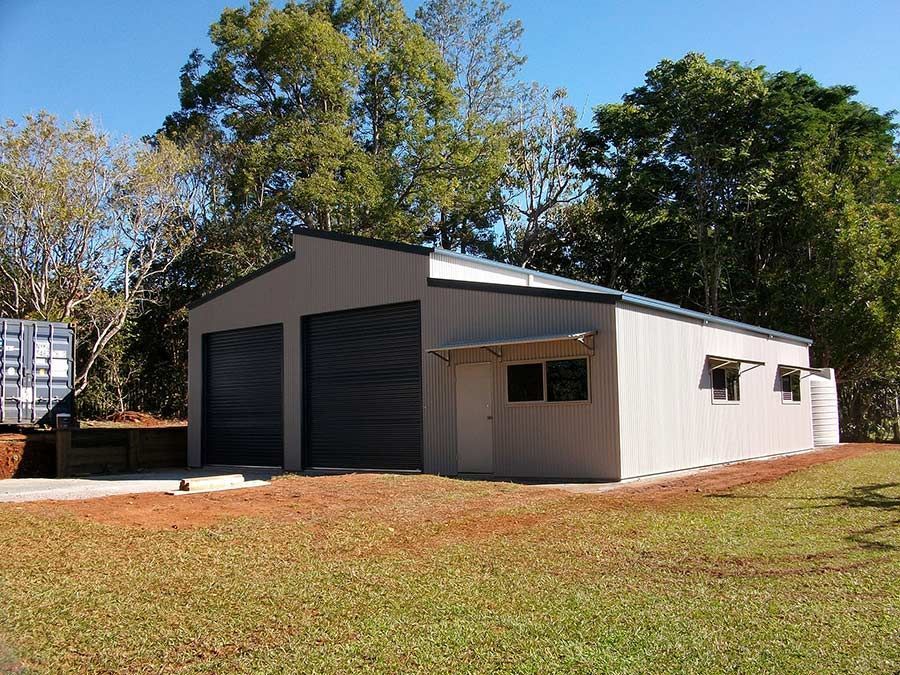 A Large Building With Two Garage Doors — Just Sheds In Kunda Park, QLD