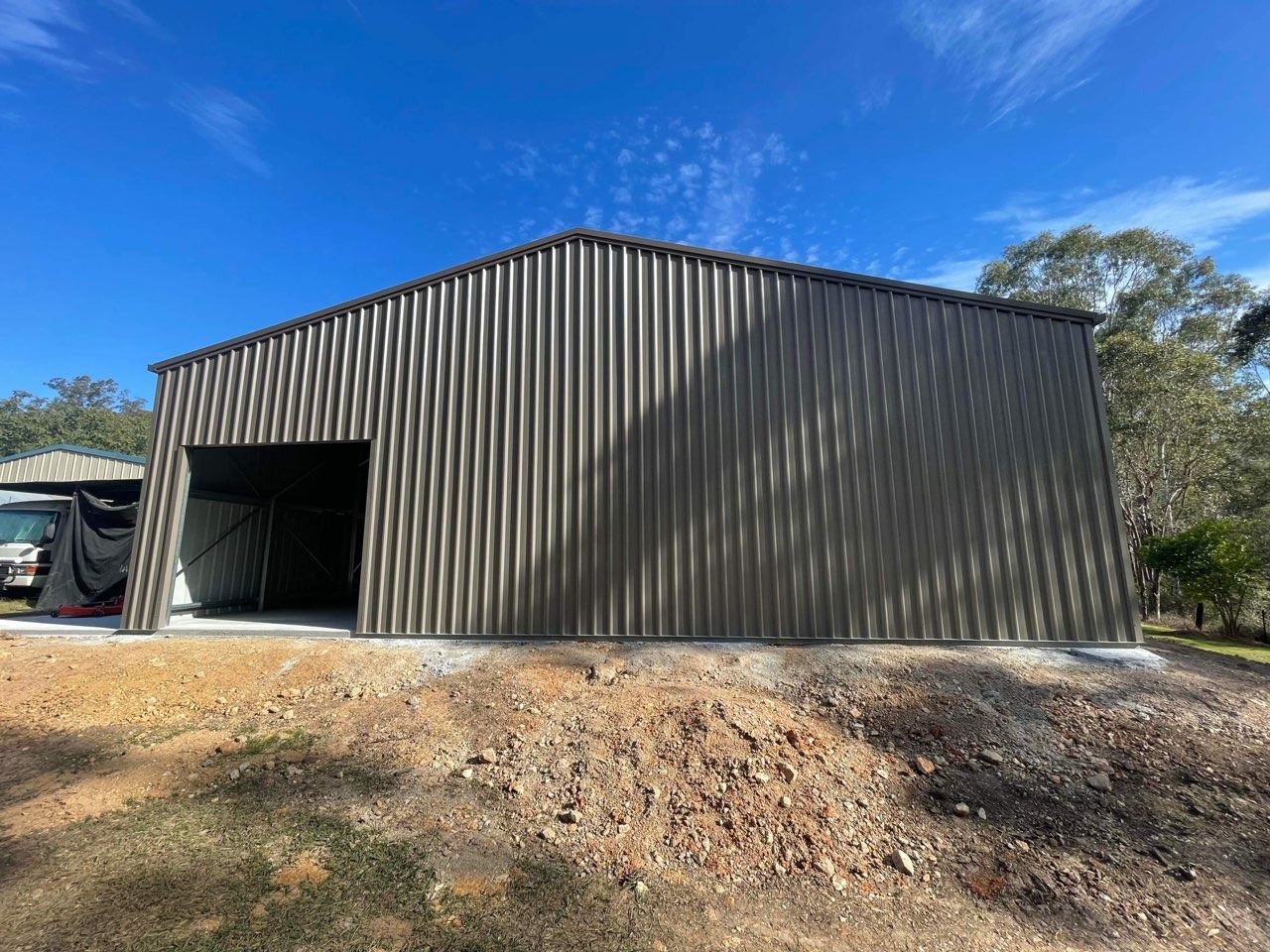 Large Brown Metal Shed