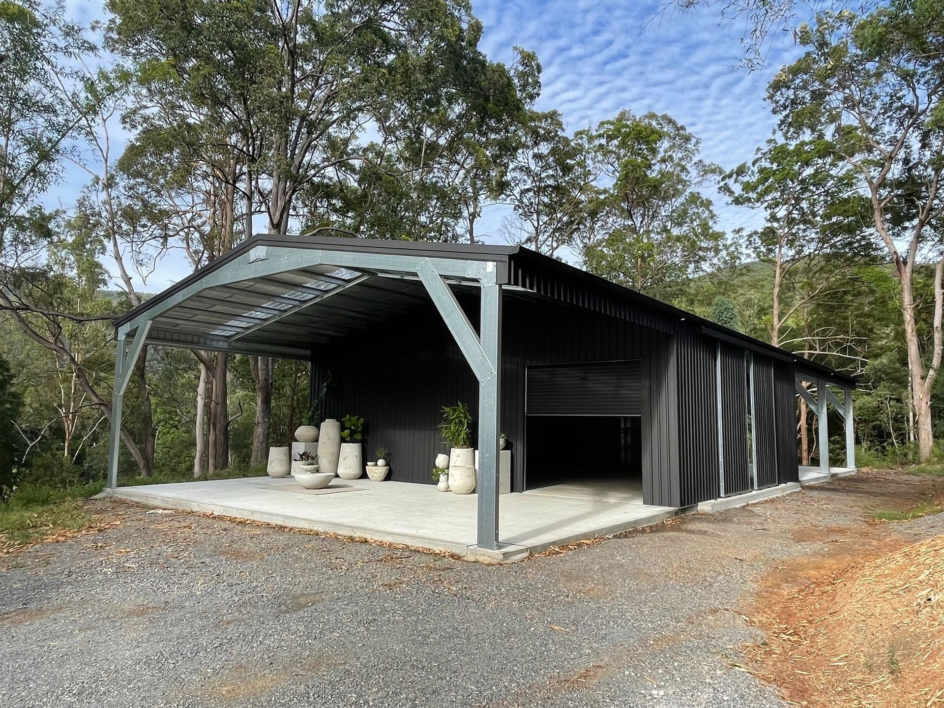 Modern Black Metal Shed At Backyard