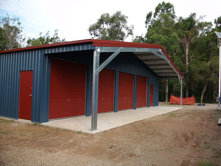 A Building With Red Doors and a Red Roof — Just Sheds In Kunda Park, QLD
