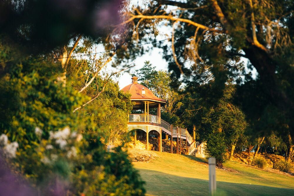 A Gazebo In The Middle Of A Park Surrounded By Trees — Just Sheds In Ipswich, QLD