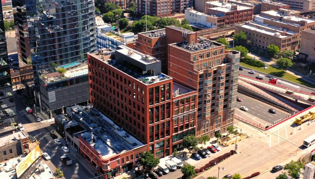 An aerial view of a city with a lot of buildings