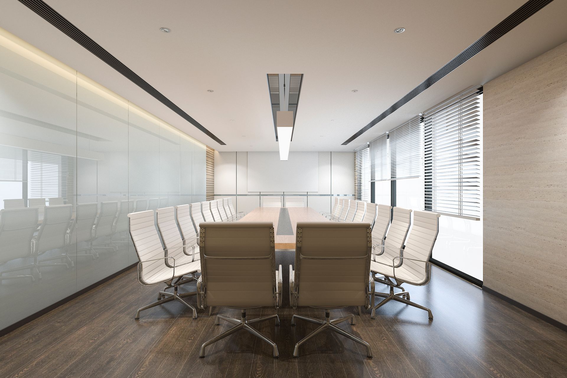 A conference room with a long table and chairs