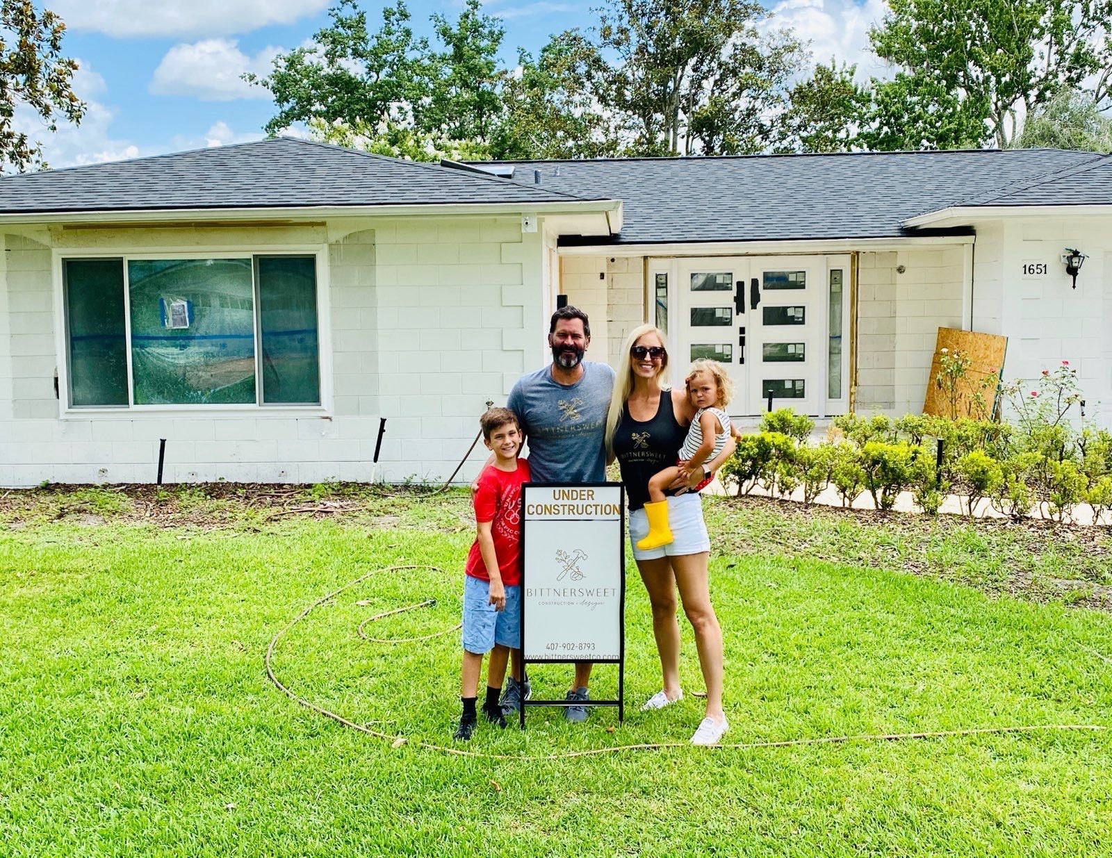 BittnerSweet Co. owners in front of a Maitland home remodeling project.