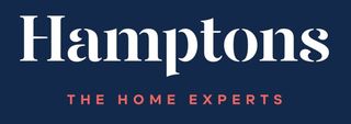 Hamptons real estate logo on a dark blue background, featuring white text "Hamptons" above red text "THE HOME EXPERTS."