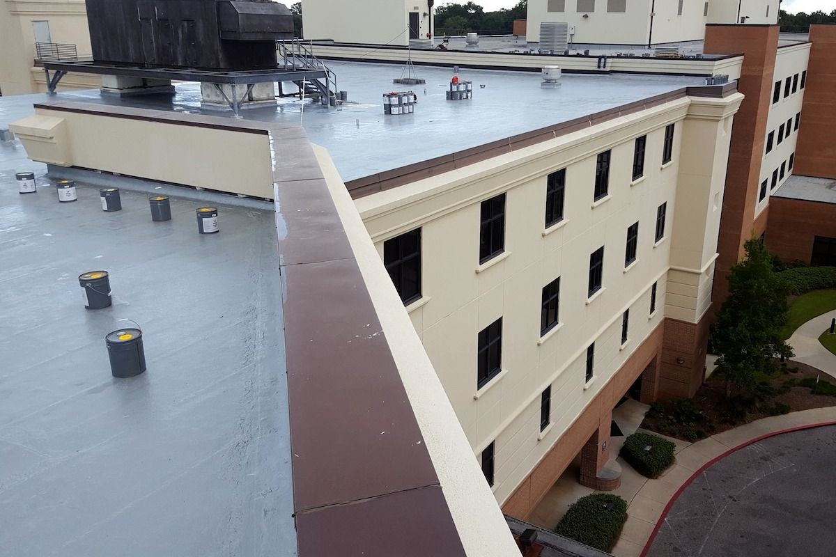 View from a rooftop overlooking a multi-story building with