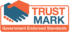 TrustMark logo: Two hands shaking in orange and blue.