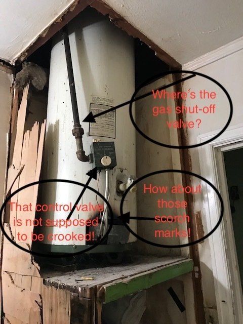 A water heater in a damaged enclosure. Text circles indicate questions about gas shut-off, control valve, and scorch marks.