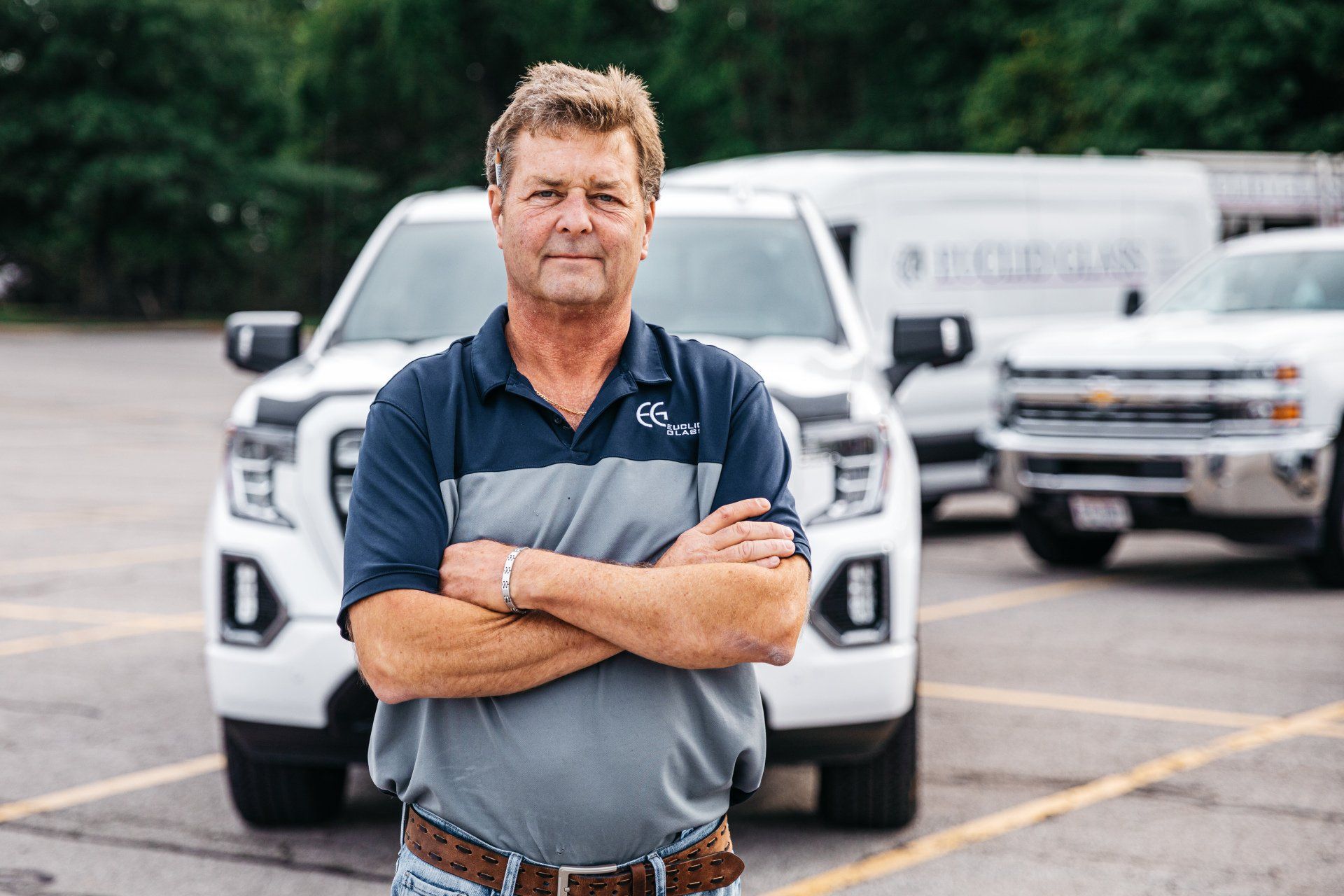 Euclid Glass Staff Behind Three White Vehicles — Willoughby, OH — Euclid Glass & Door