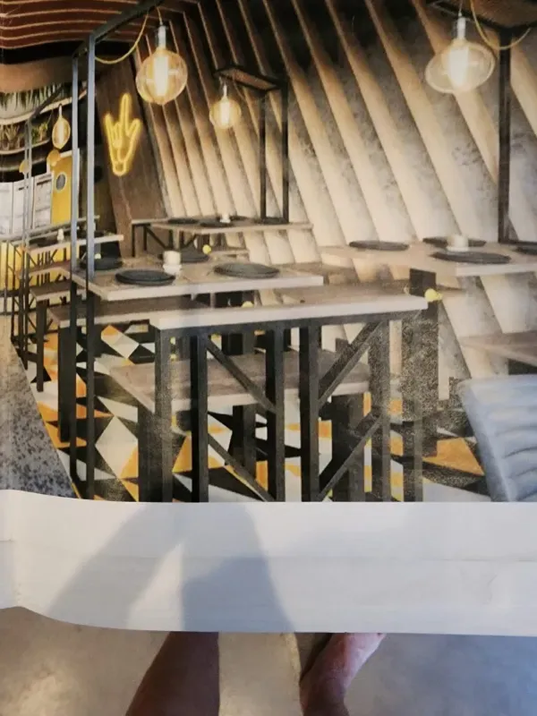 An artist 's impression of a restaurant with tables and chairs