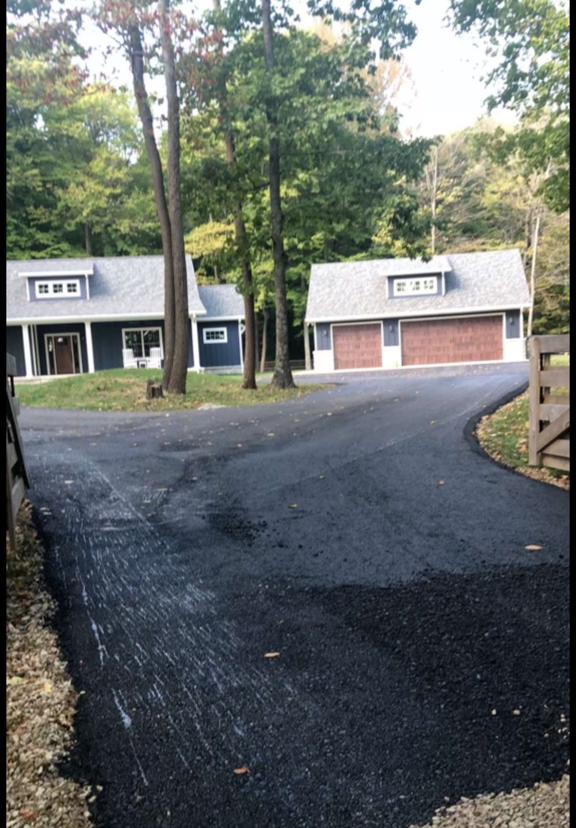 A Driveway Leading To A House With Two Garages | Southern, IN | OK&A Fleetwood Asphalt Concrete Raising
