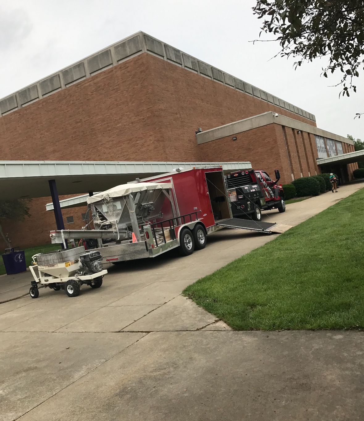 A Truck With A Trailer Attached | Southern, IN | OK&A Fleetwood Asphalt Concrete Raising