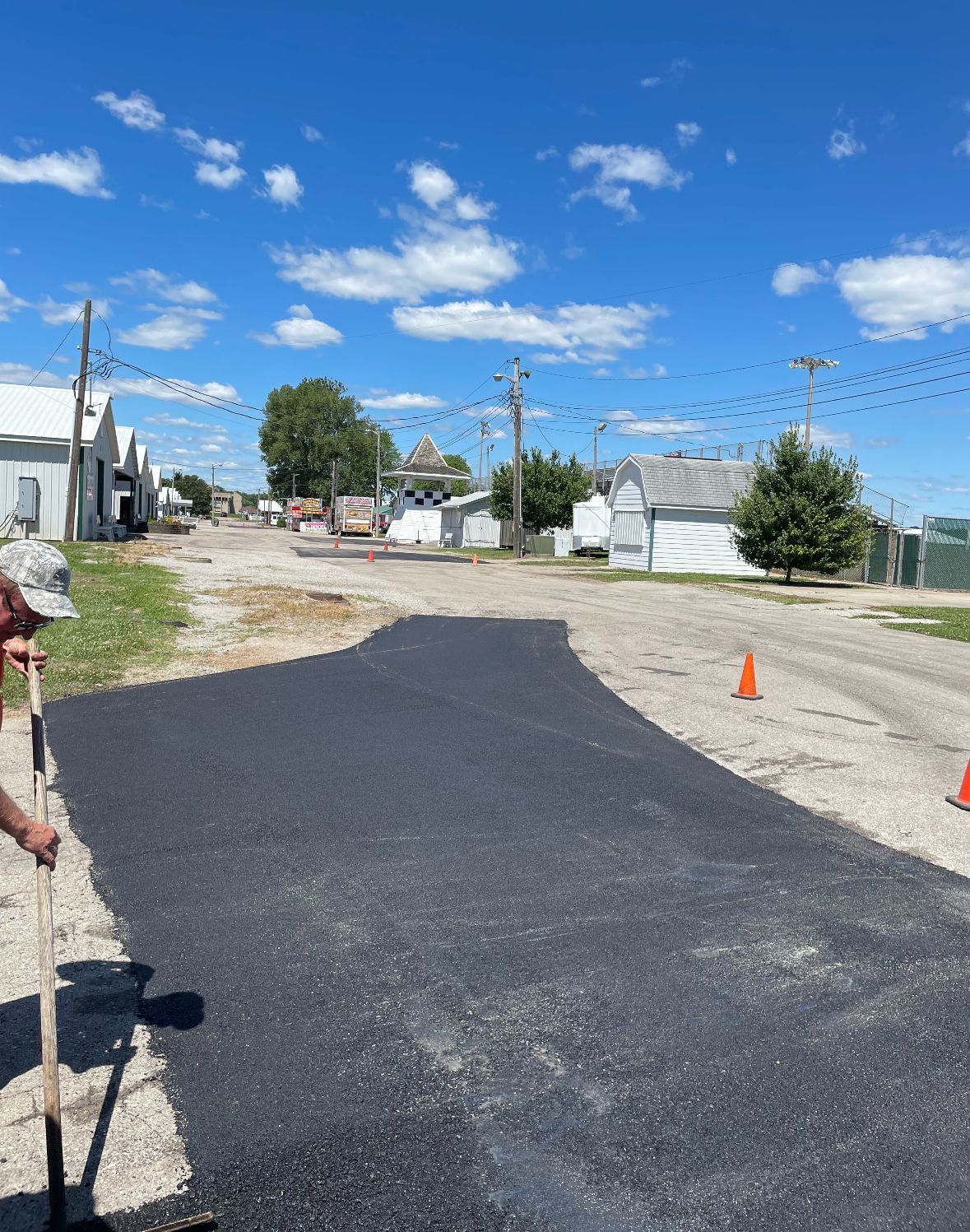 Adding Asphalt On The Side Of A Road | Southern, IN | OK&A Fleetwood Asphalt Concrete Raising