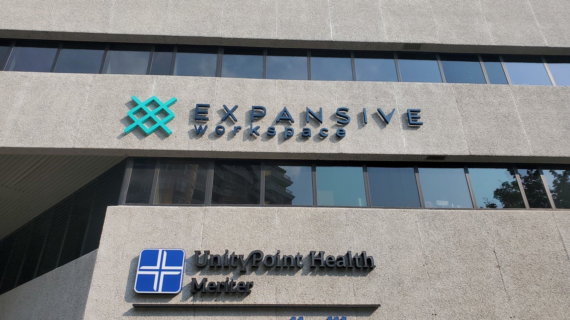 A building with a sign that says expandive on it
