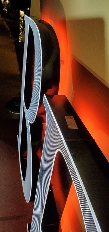 A close up of a sign that says b on it