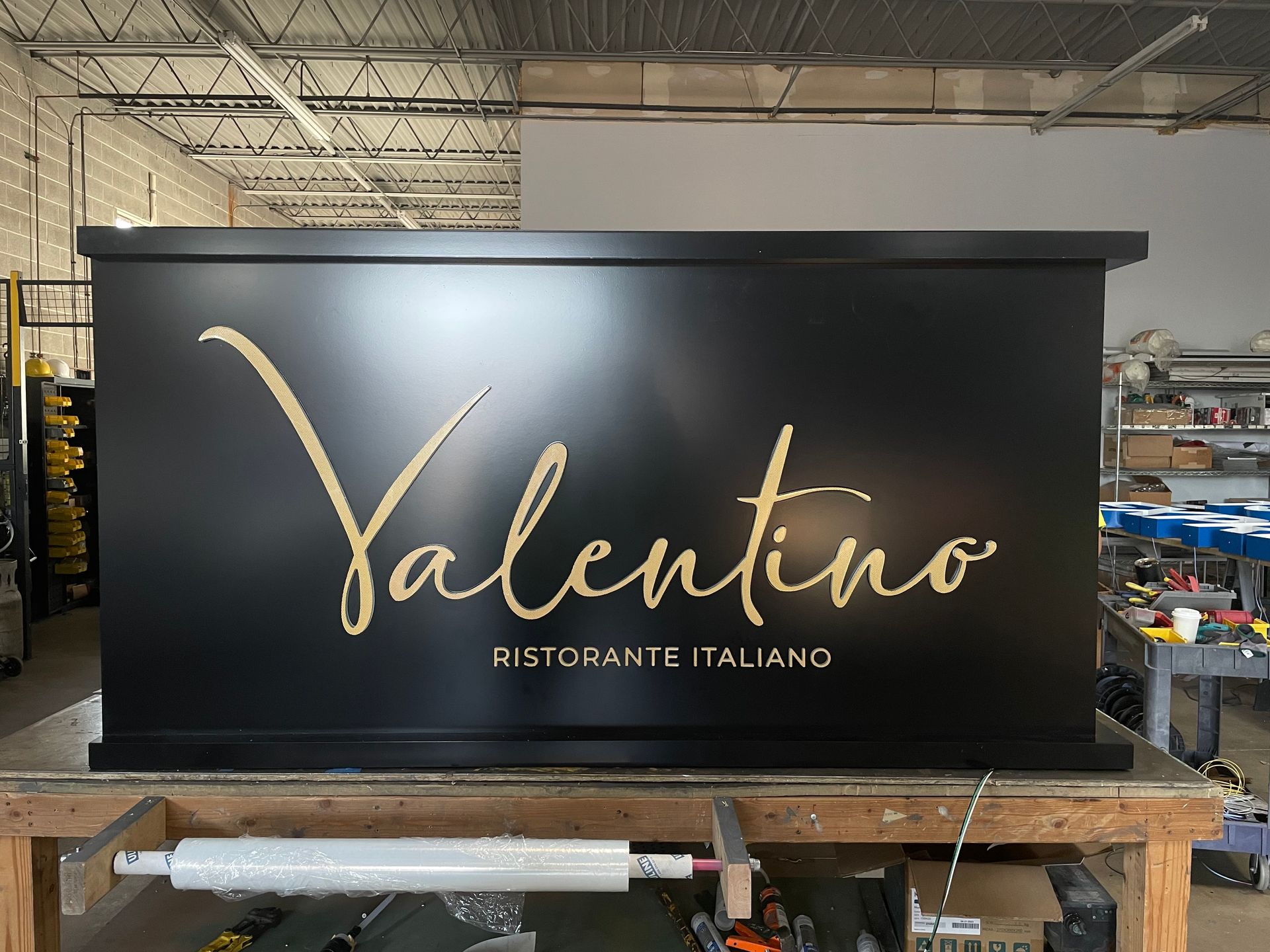 A black box with the word valentino on it