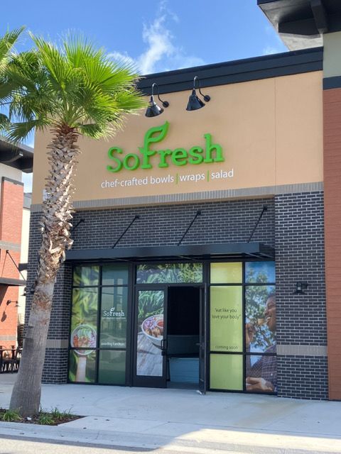 A blue building with a sign that says flight safety on it.