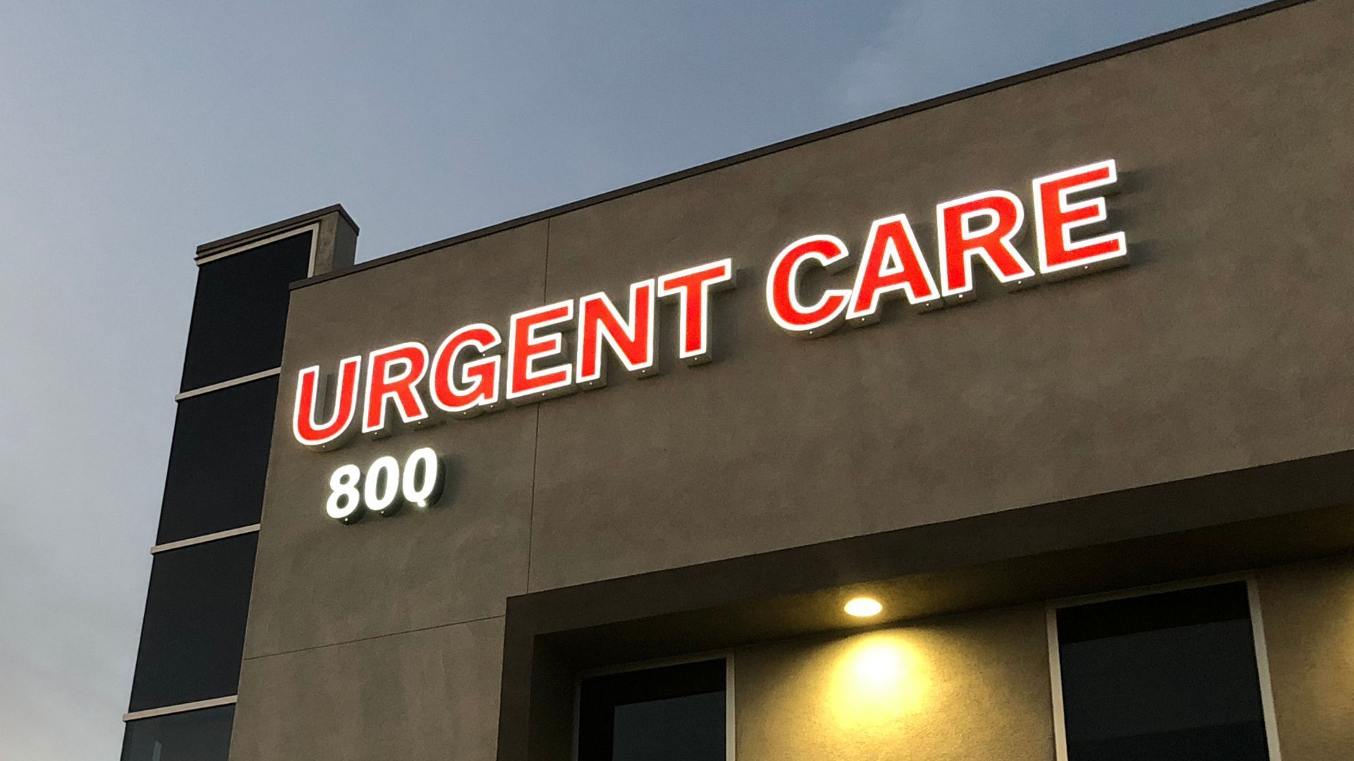 A building with a sign that says urgent care on it