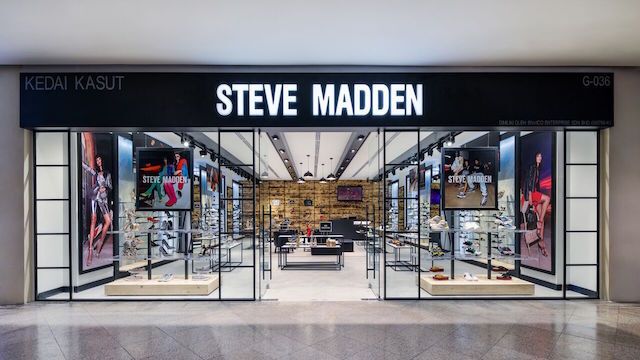 An artist 's impression of a steve madden store.
