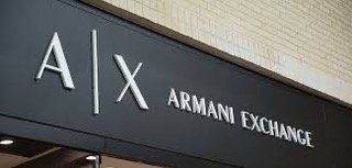 A close up of a sign for armani exchange.