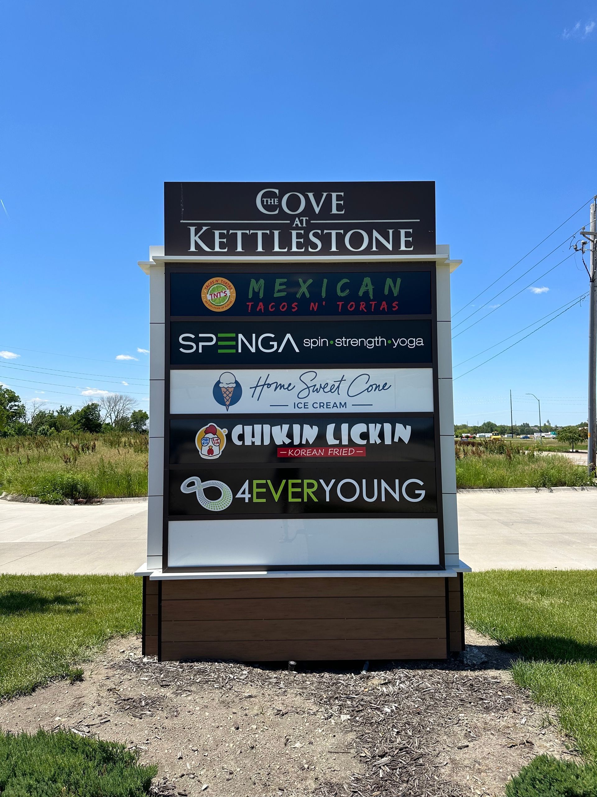 A sign that says cove of kettlestone on it