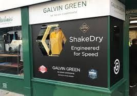 A store front with a sign that says `` galvin green shakedry engineered for speed ''.