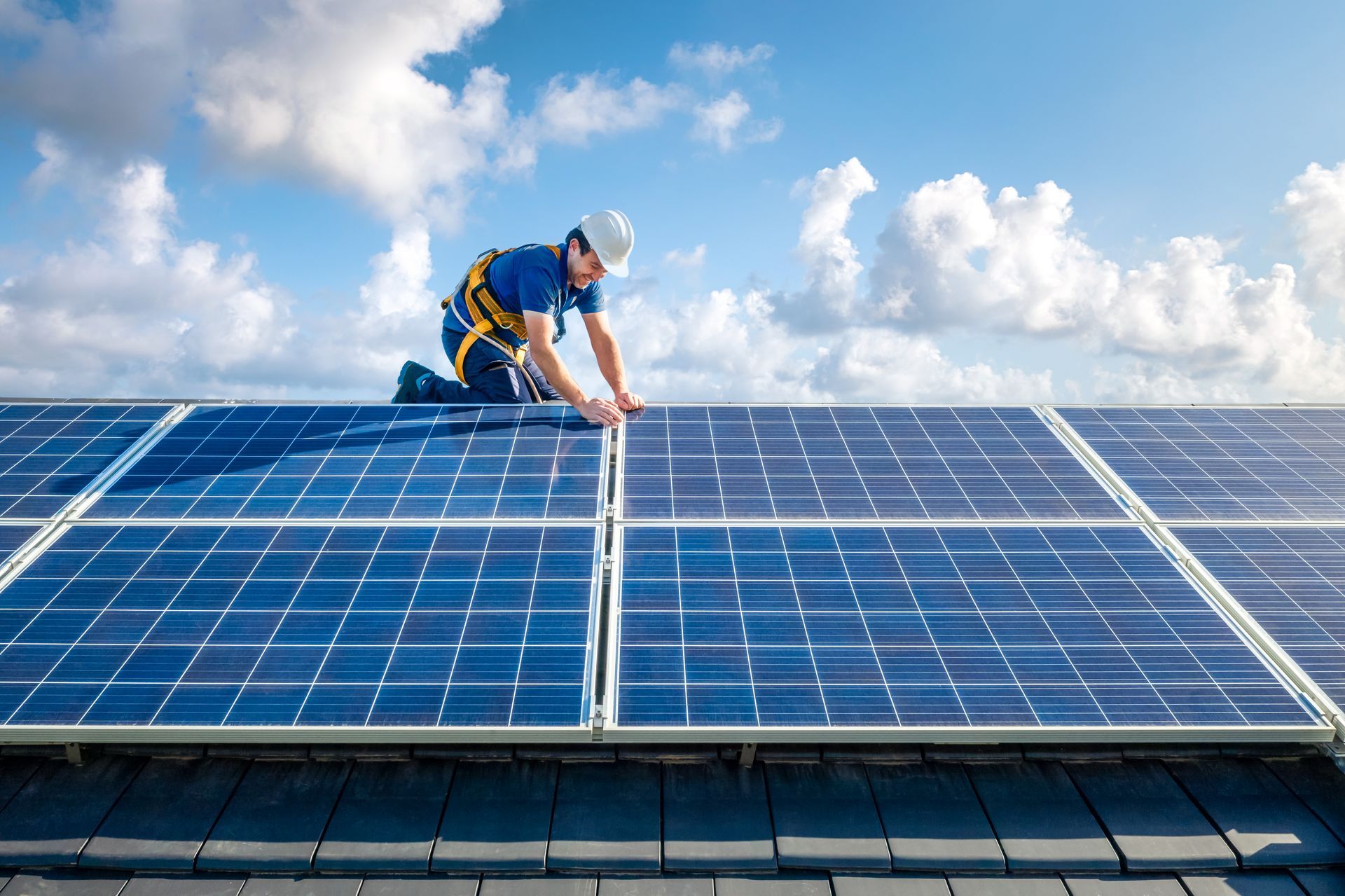 Man Installing Solar Panels — Pearl City, HI — Mana Energy Solutions
