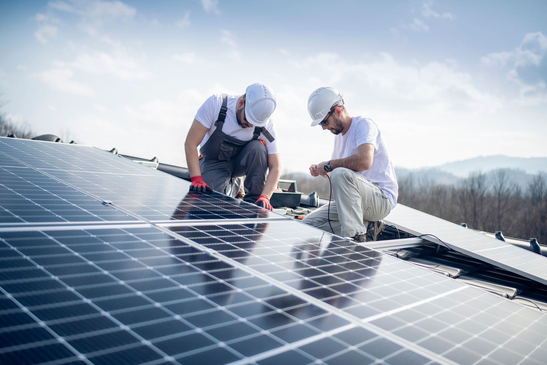Workers On A Roof — Pearl City, HI — Mana Energy Solutions