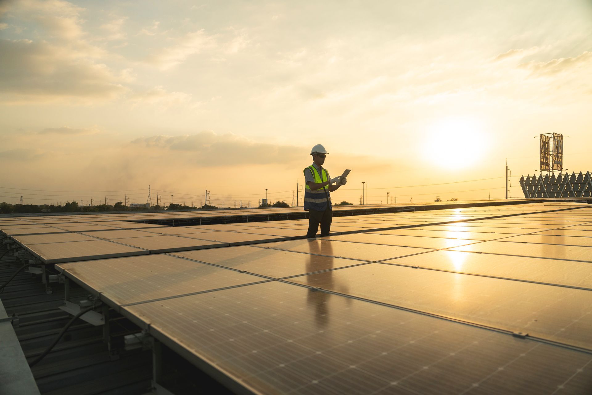 Man Monitoring Solar Panels — Pearl City, HI — Mana Energy Solutions