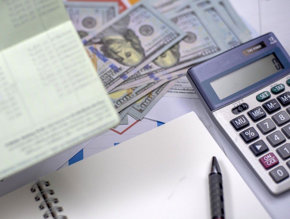 Money And Calculator — Grand Blanc, MI — Darby Tax Service