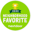 A green sticker that says neighborhood favorite nextdoor