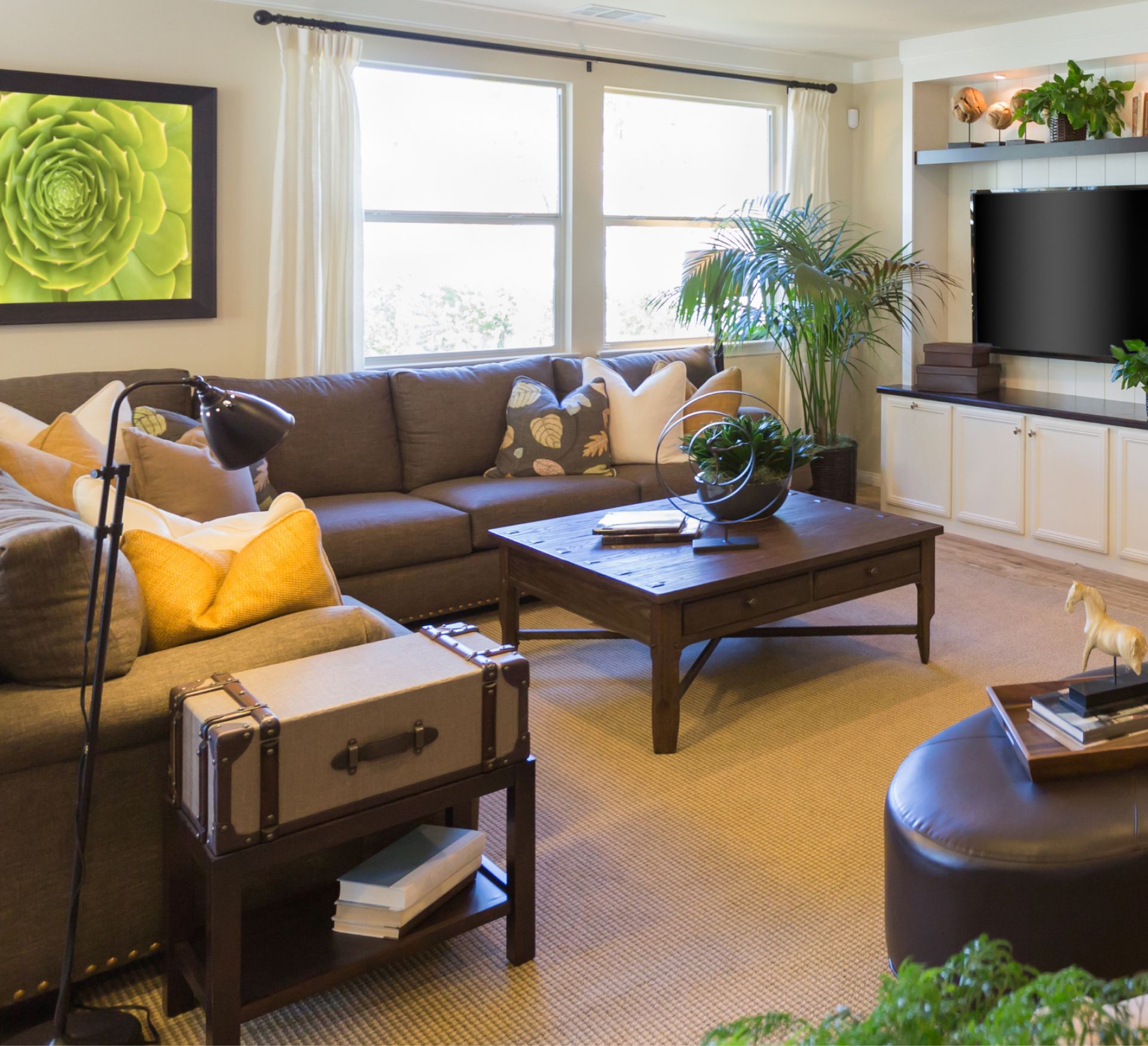 A living room with a couch and a coffee table