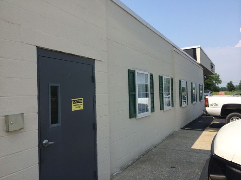 Noco Building With Freshly Painted Grey Brick