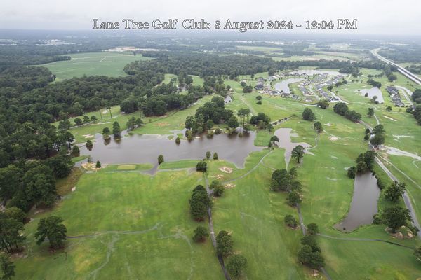 An aerial view of the lake tree golf club