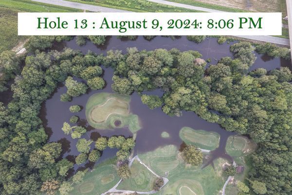 An aerial view of a golf course on august 9th
