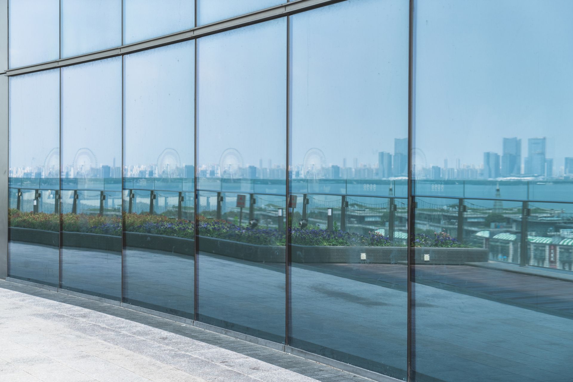 A Large Building with A Lot of Windows and A View of The City