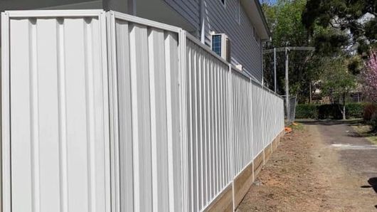 tall white fence