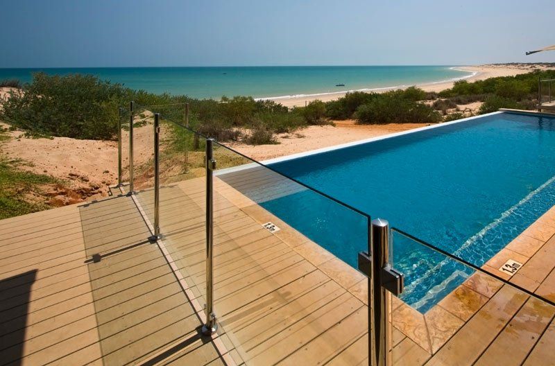 glass fence next to pool