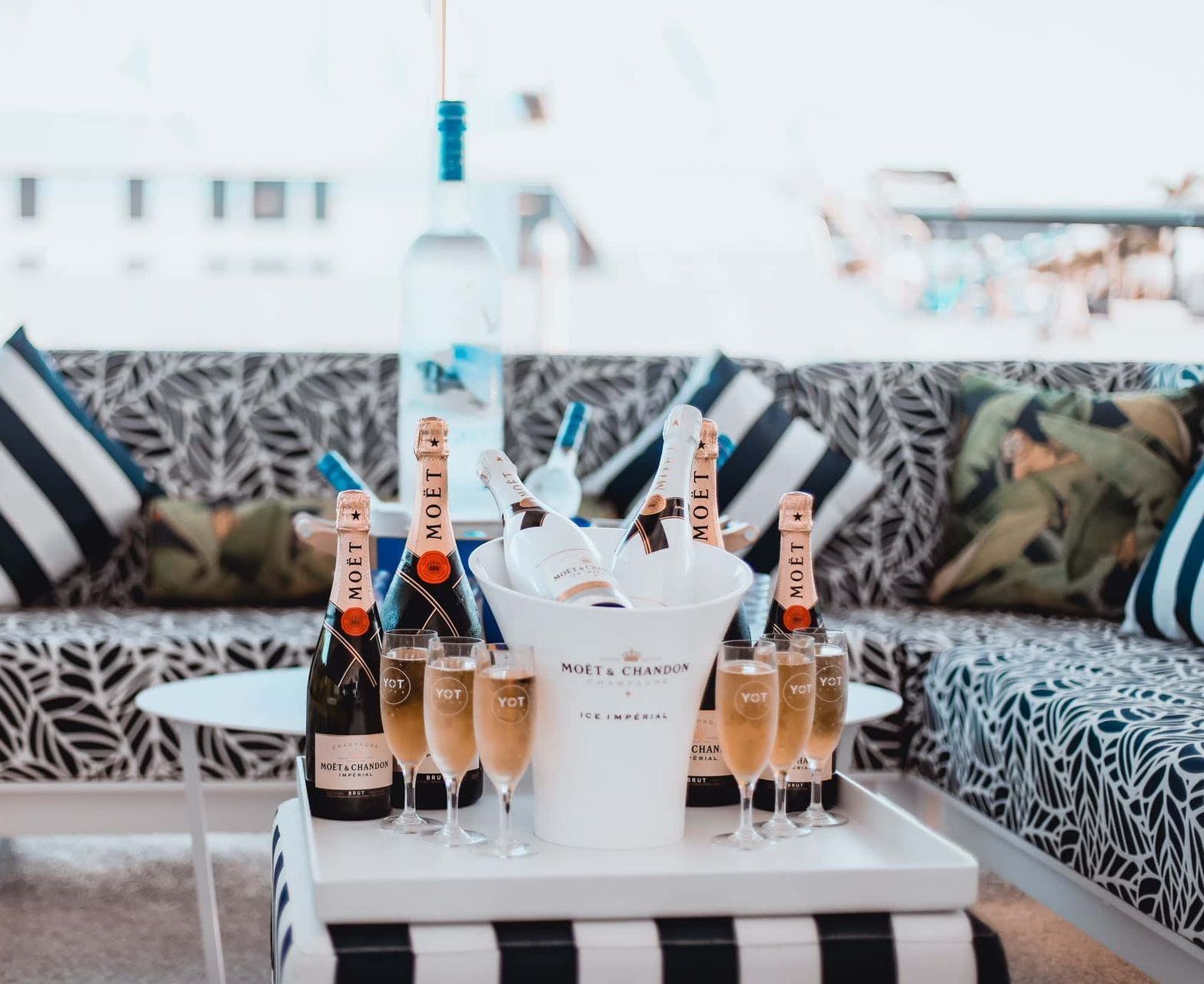 A Table with Bottles of Champagne and Glasses on It — Club Nautical in Gold Coast, QLD