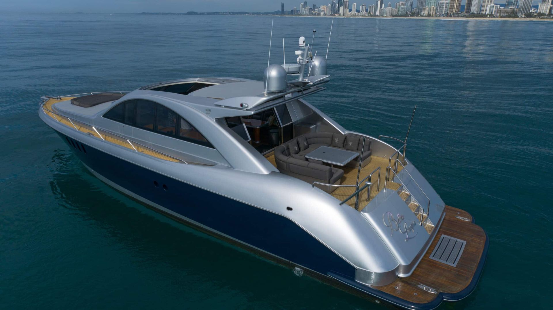 An aerial view of a boat floating on top of a body of water.