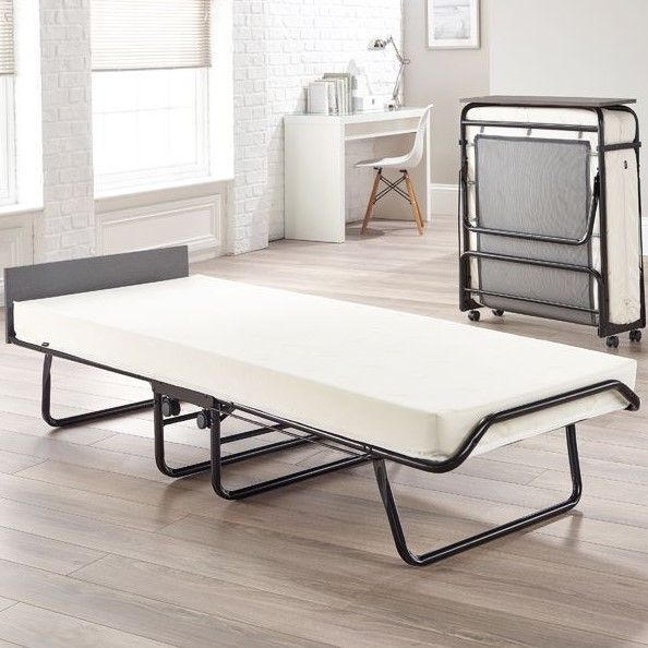 A folding bed with a mattress and a desk in a room | Bedlam Beds Bristol