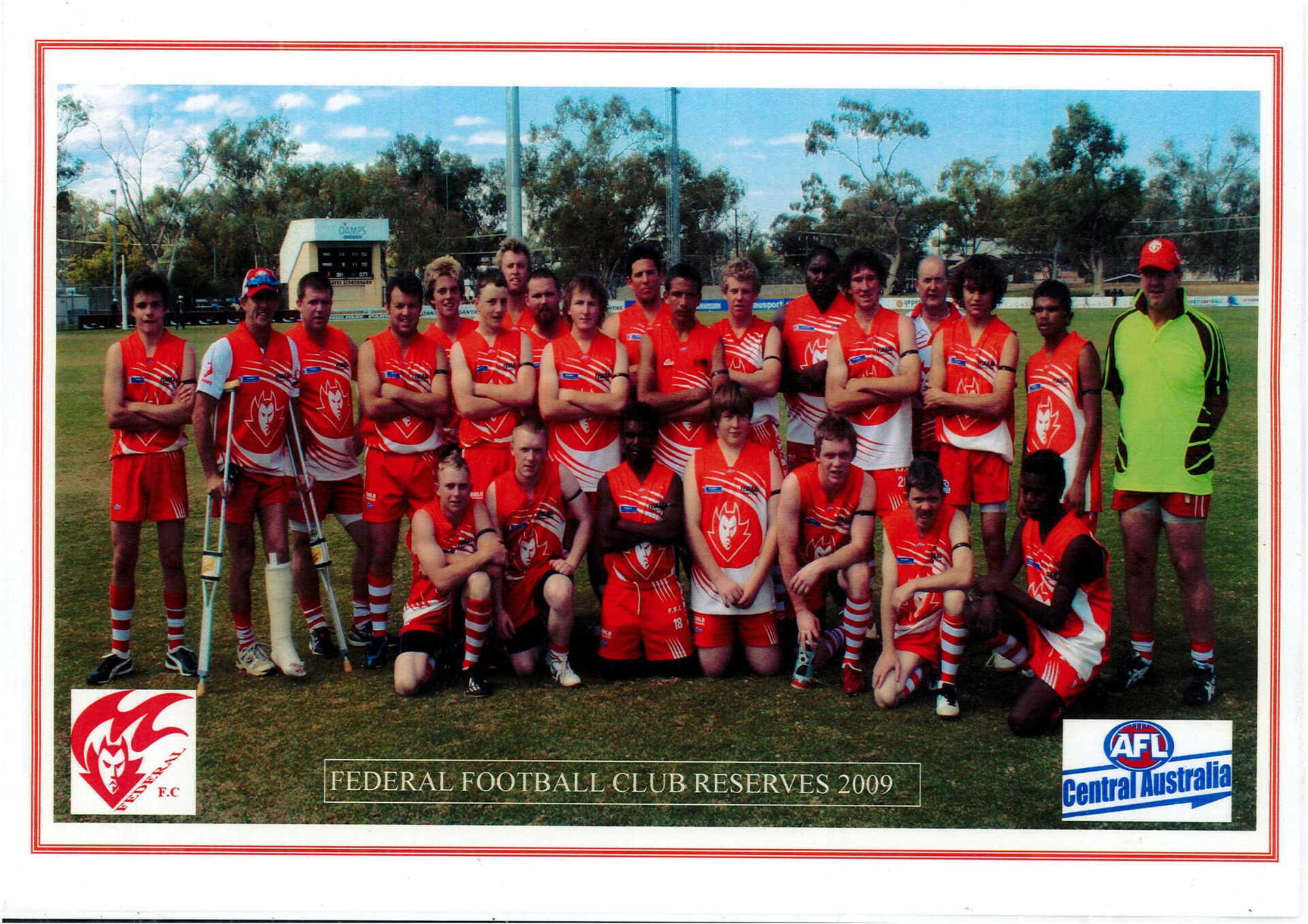 A group of soccer players posing for a photo with the words federal footbal club on the bottom