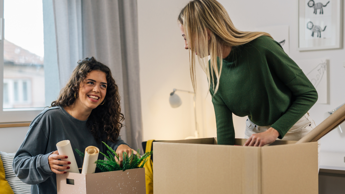 College students moving into an apartment