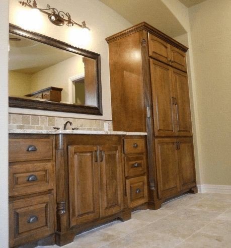 custom bathroom cabinets with linen storage built by custom cabinet makers JB murphy company