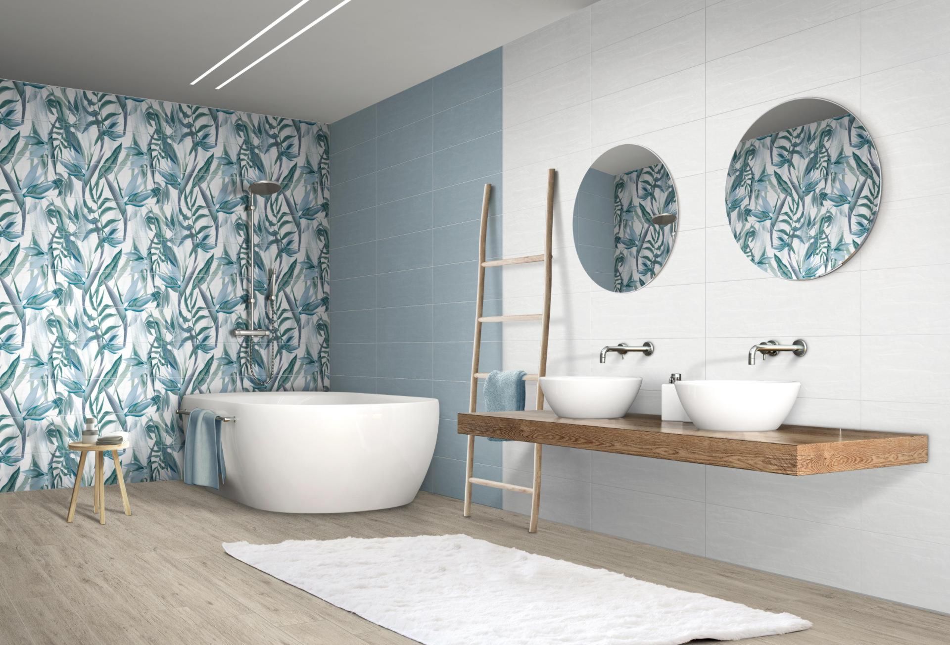 Un bagno con vasca, lavandini, specchi e tappeto.