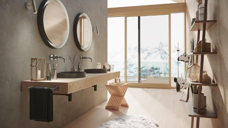 Un bagno con due lavandini e una lampada a terra